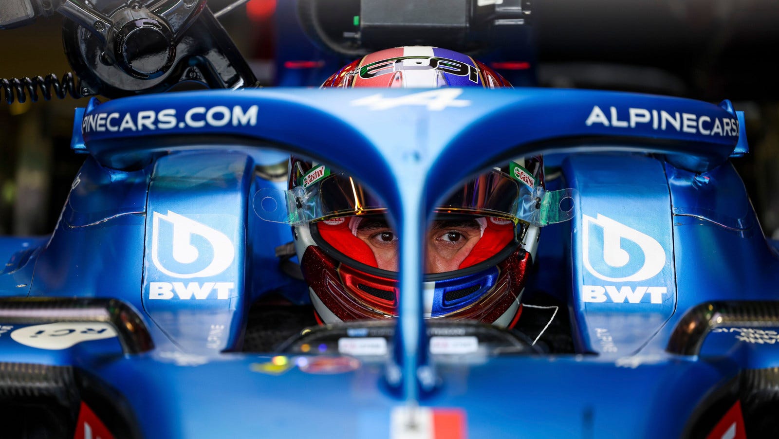 Formula One Alpine driver in car close-up